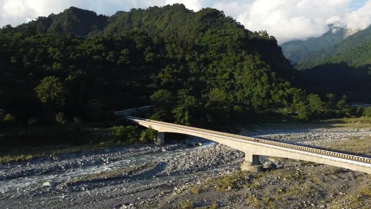Deopani Bridge — Side view with mountains and clouds