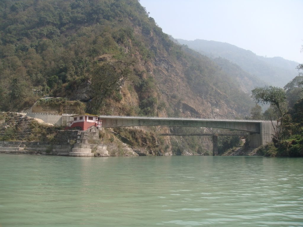 Dikchu Bridge — View from river showing bridge and mountains