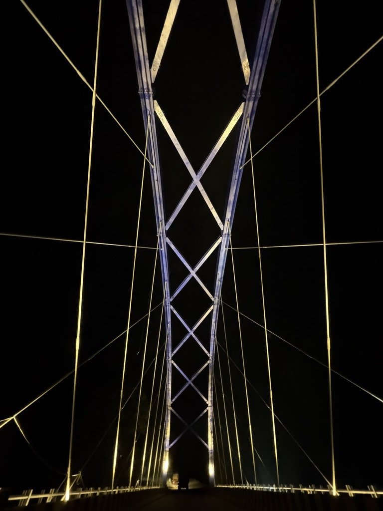 Tlawng / Faith Bridge — View from deck looking up at arch